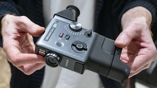 Fujifilm Instax Mini Evo Cinema camera in user's hands
