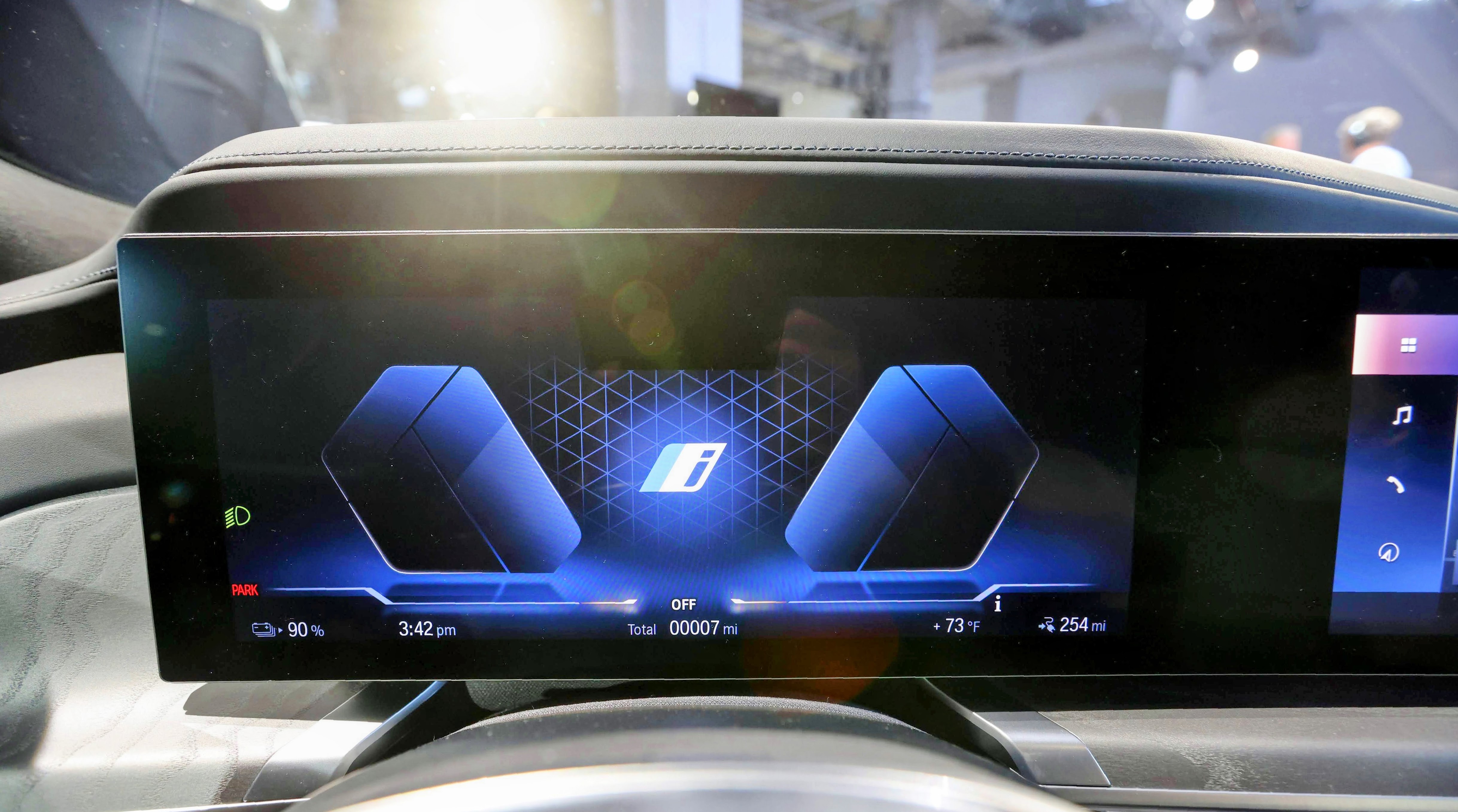 Close-up of the cluster display behind the steering wheel