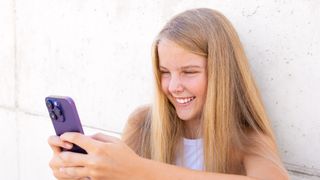 teen girl using phone