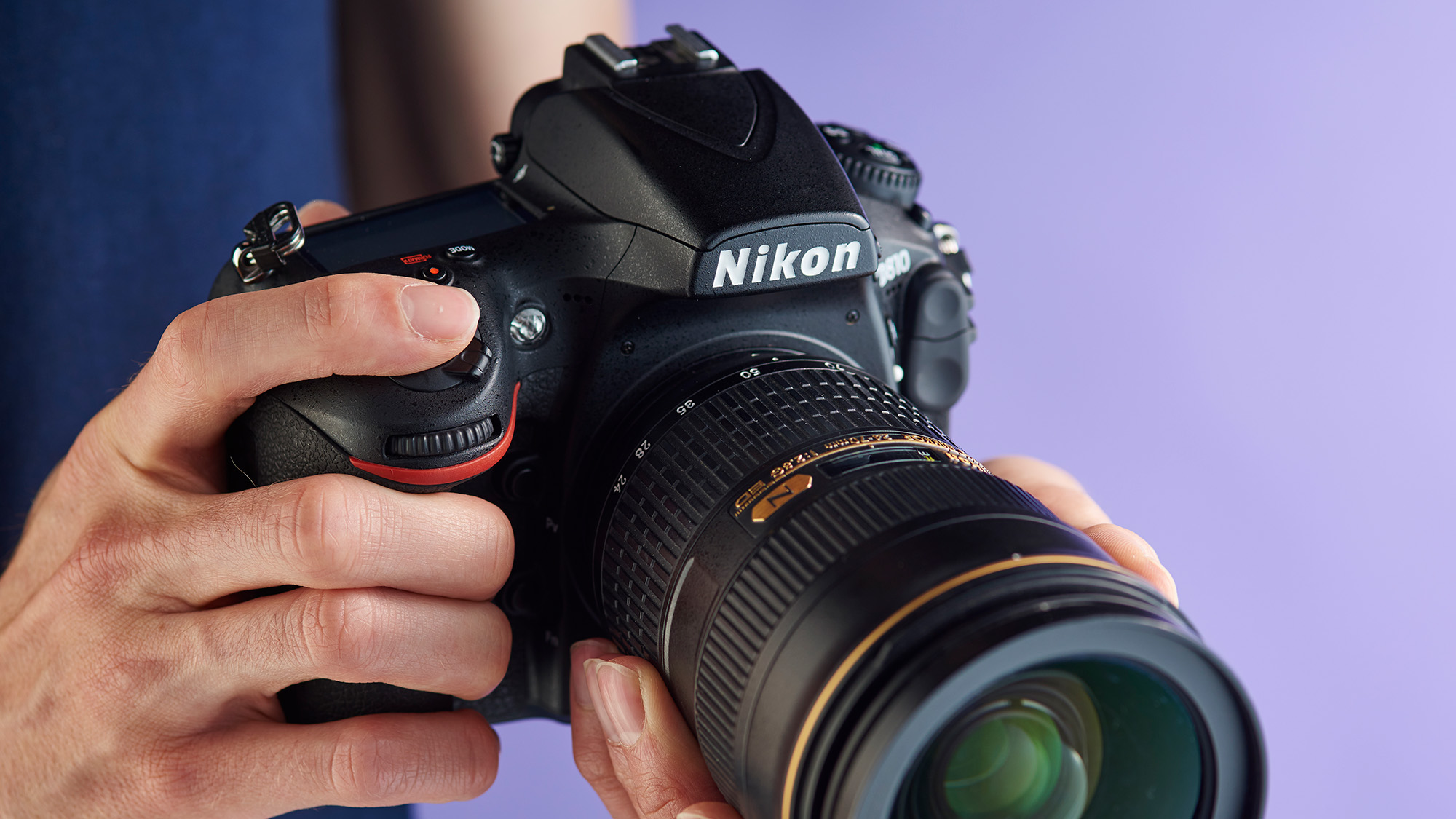 Person holding Nikon D810