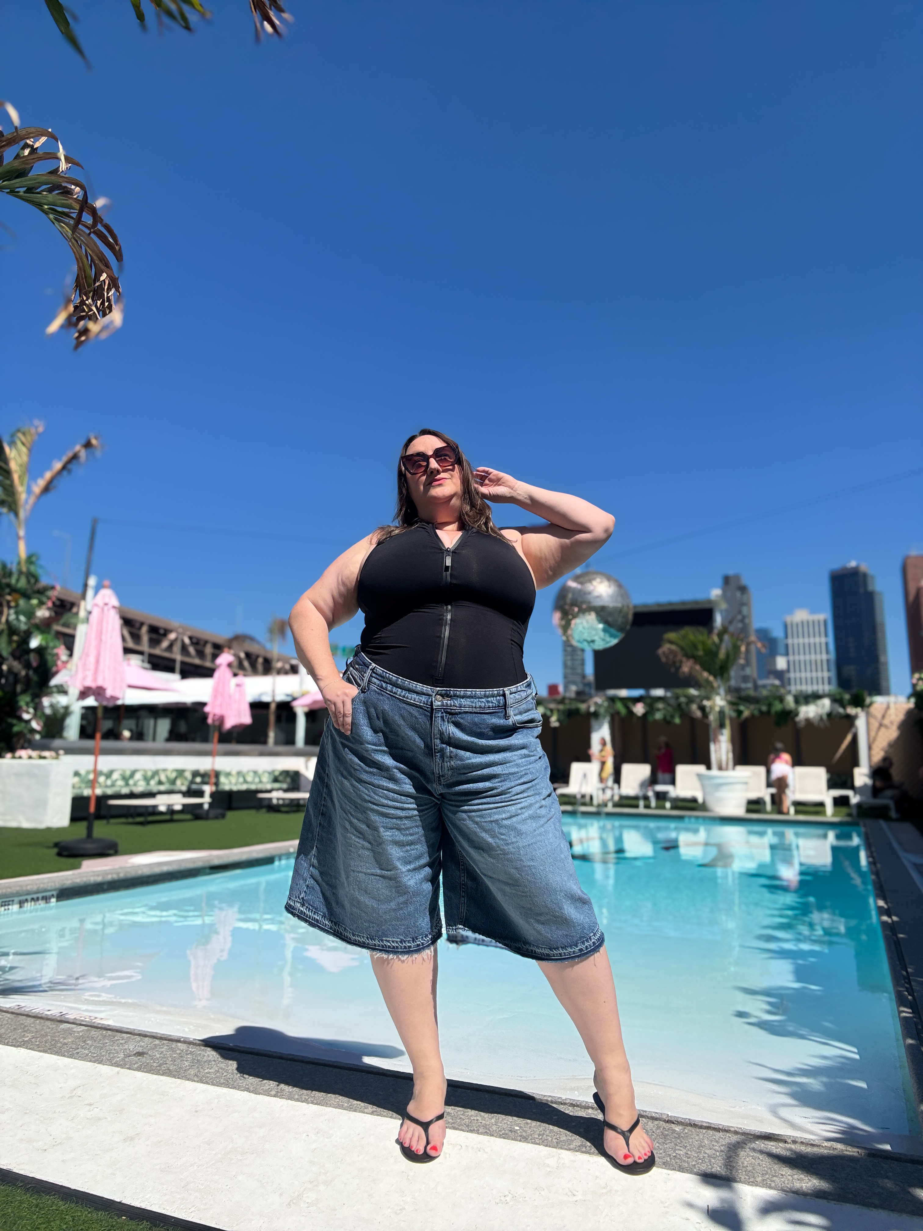Sarah Chiwaya styling Bermuda shorts and a swimsuit for a special summer occasion