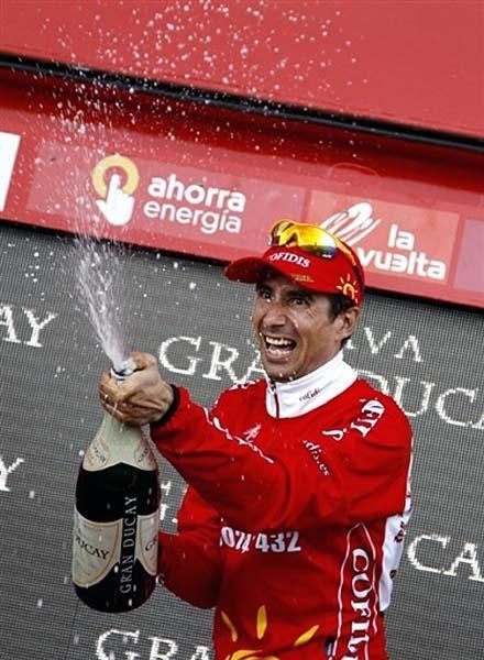 David Moncouti&eacute; (Cofidis) sprays champagne.