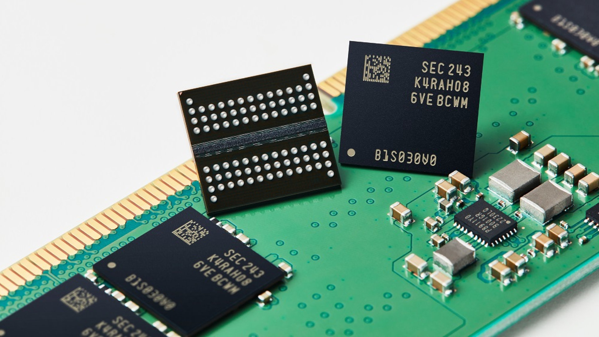 A promotional image for Samsung&#039;s 12 nm-class DDR5-DRAM production, showing multiple DRAM modules on a UDIMM circuit board.