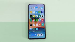 A Xiaomi Redmi Note 10 Pro from the front, with the screen on