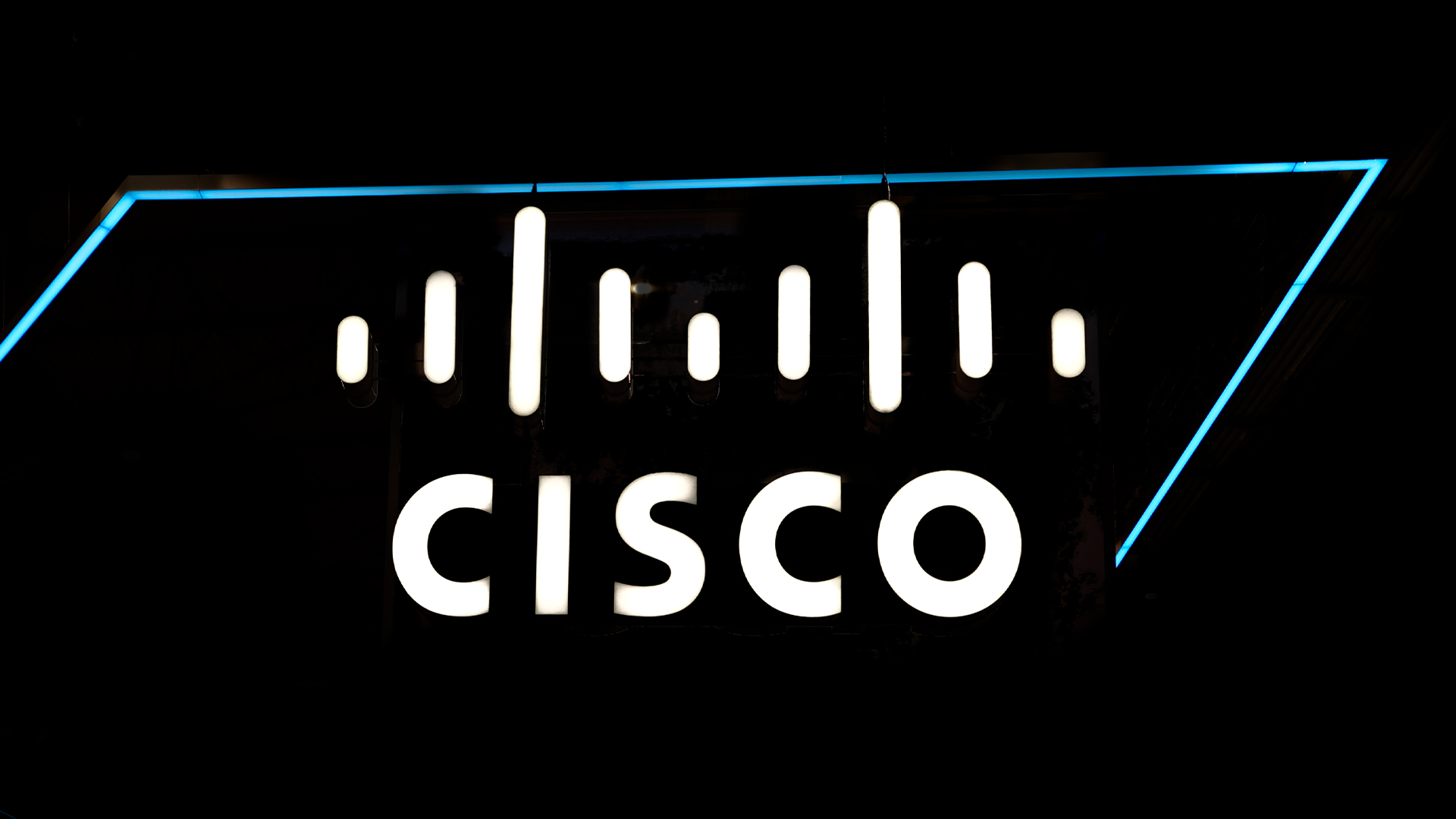 Cisco logo and branding pictured at the networking company's vendor stall at Mobile World Congress (MWC) 2023.
