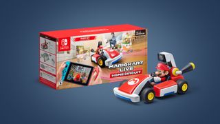 The mario kart live home circuit box and mario kart toy on a blue background