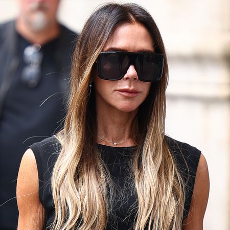 Victoria Beckham traded a Herm&egrave;s Birkin for a woven beach bag from Loro Piana on vacation in Ibiza