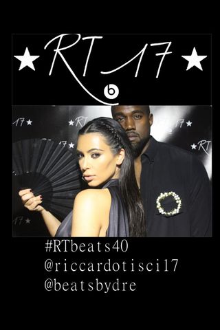 Kim Kardashian & Kanye West in the Beats by Dre photobooth