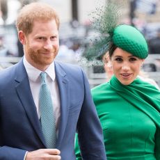 Prince Harry and Meghan Markle hold hands