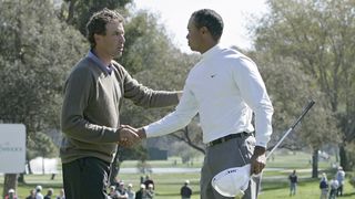 Stephen Ames congratulates Tiger Woods after his 9&8 win in the 2006 Match Play