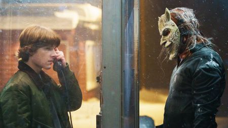 Mason Thames as Finney and Ethan Hawke as The Grabber in "Black Phone 2" (2025)