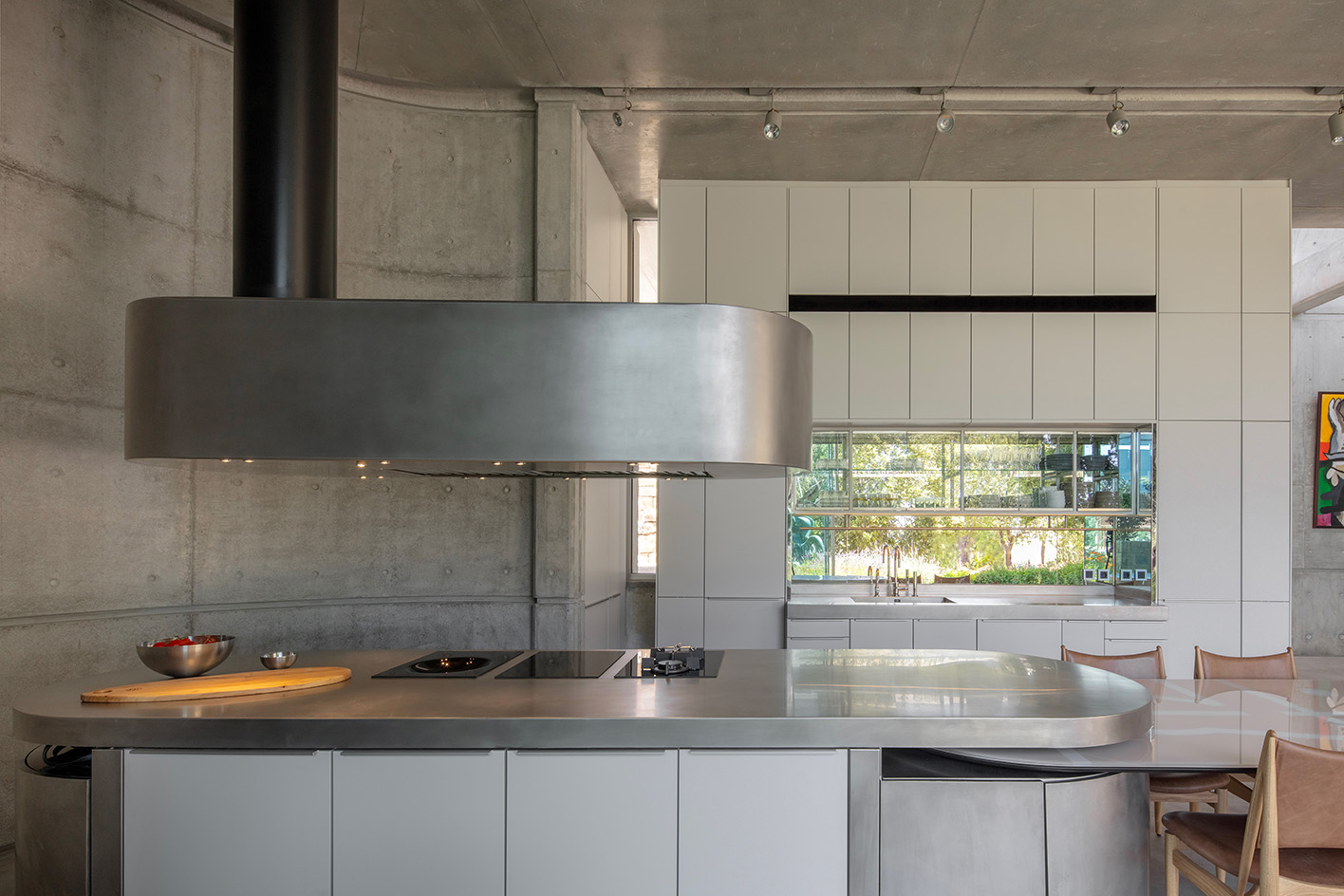 Capsule Retreat by East Architecture Studio, a concrete house in the leafy countryside with tall ceilings and minimalist interiors