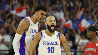  Victor Wembanyama #32 and Evan Fournier #10 of Team France celebrate making the Basketball Semi Finals at Olympics 2024