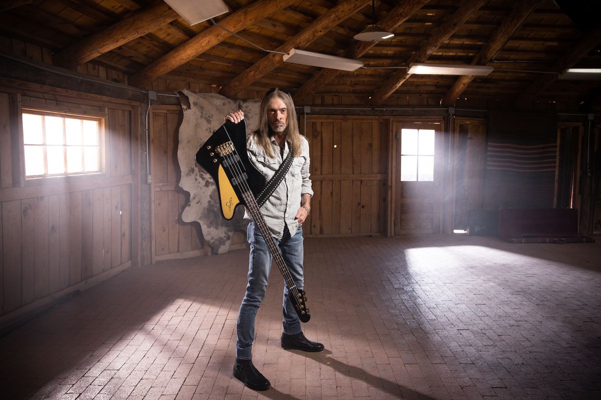 Rex Brown holds his new signature Gibson Thunderbird bass