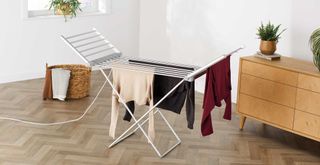 Aldi heated clothes airer in a kitchen with clothes drying