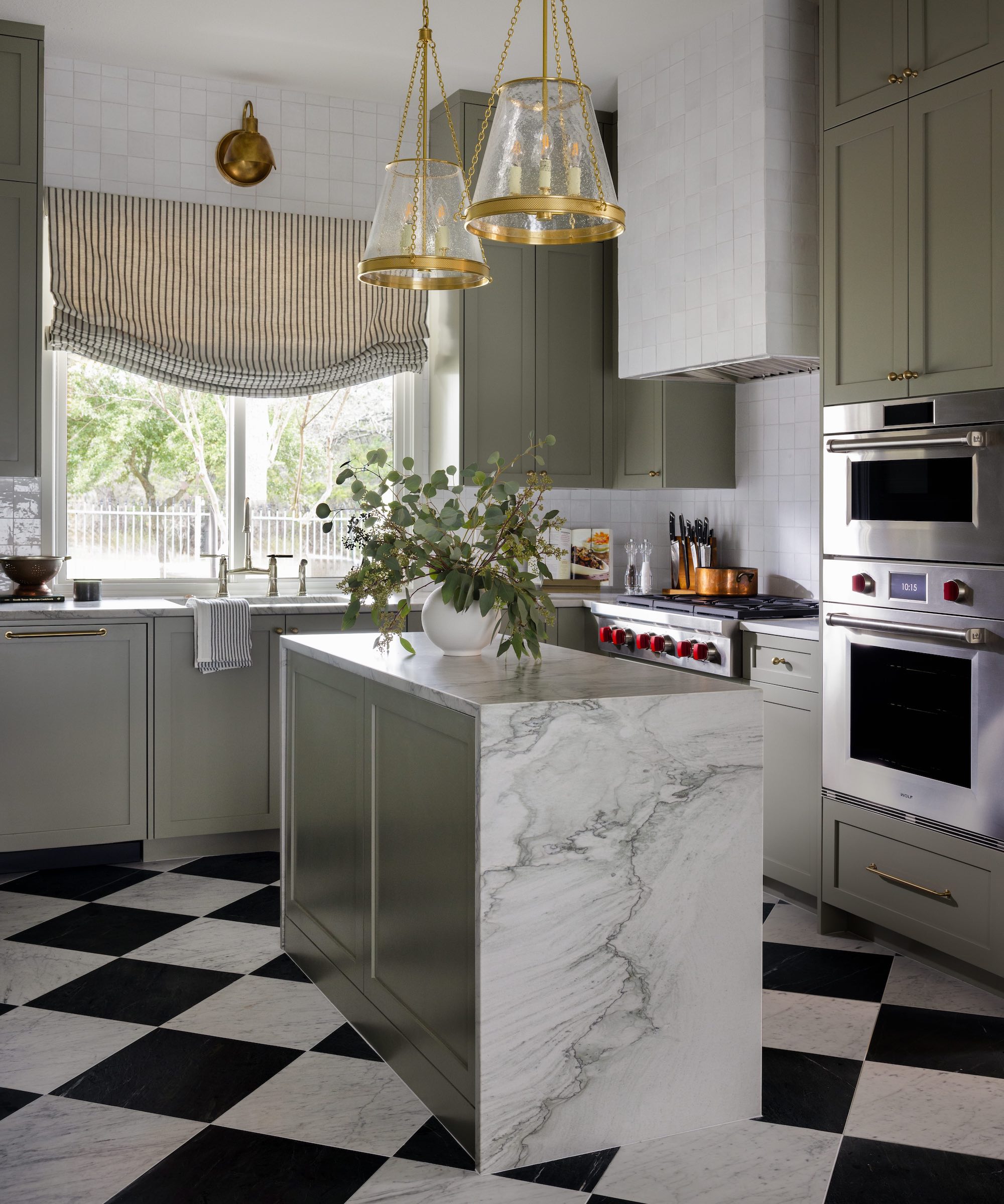 grey kitchen with marble island and checked flooring