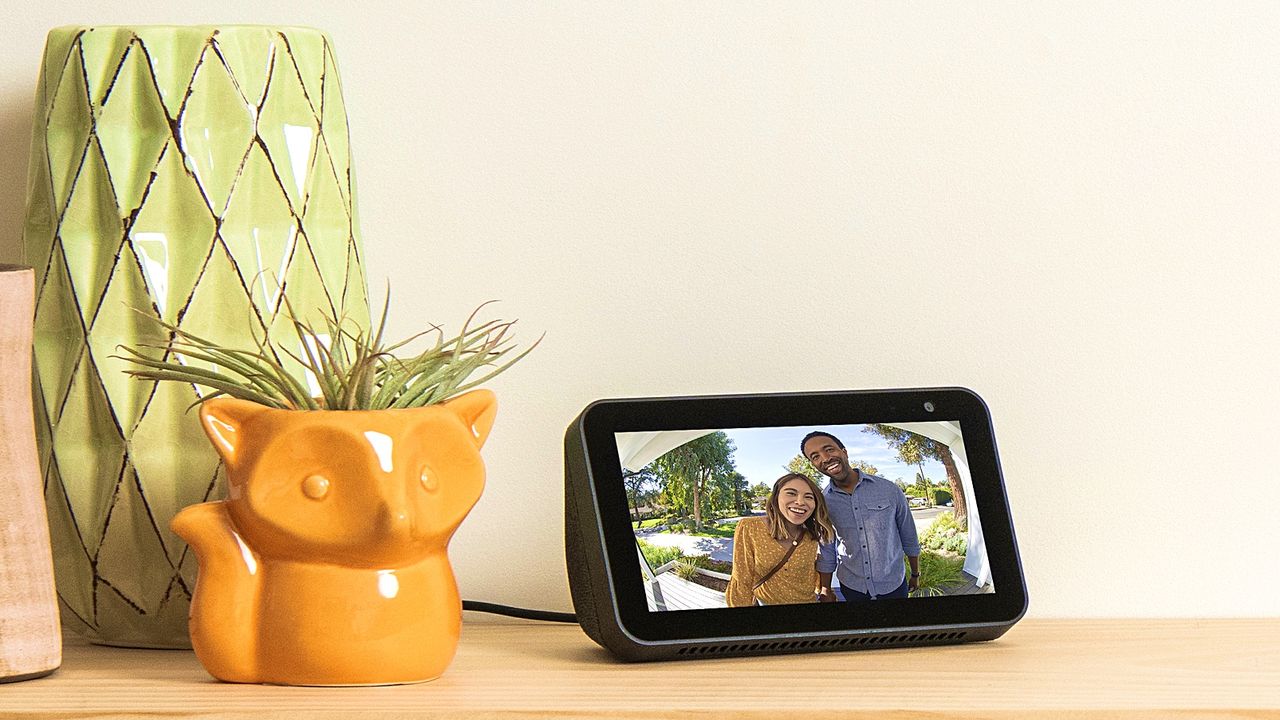 Amazon Echo Show deals 2023, an Echo Show sits on a table next to a plant