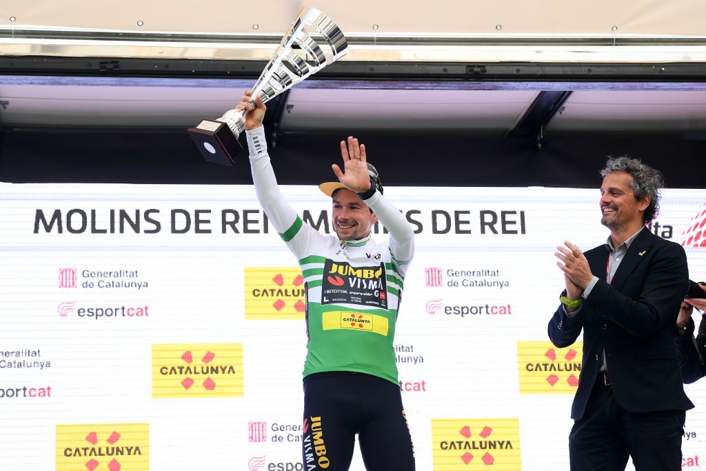 MOLINS DE REI SPAIN MARCH 25 Primoz Roglic of Slovenia and Team JumboVisma Green Leader Jersey celebrates at podium during the 102nd Volta Ciclista a Catalunya 2023 Stage 6 a 1741km stage from Martorell to Molins de Rei UCIWT on March 25 2023 in Molins de Rey Spain Photo by David RamosGetty Images