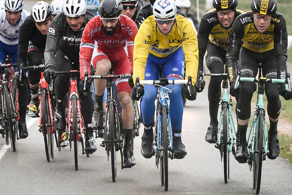 Arnaud Demare (FDJ), wearing the overall leader's yellow jersey,