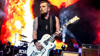  Billy Duffy of The Cult performs during the Revolution 3 Tour at Michigan Lottery Amphitheatre on July 24, 2018 in Sterling Heights, Michigan.