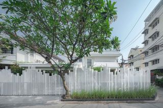 hero exterior with tree of InJoy Snow Hotel Bangkok by HAS design and research