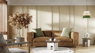 neutral japandi-style living room with potted tree, brown sofa and wall panelling