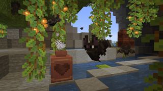Image of Minecraft 1.20.3 / 1.20.50 with bats and functional pots.