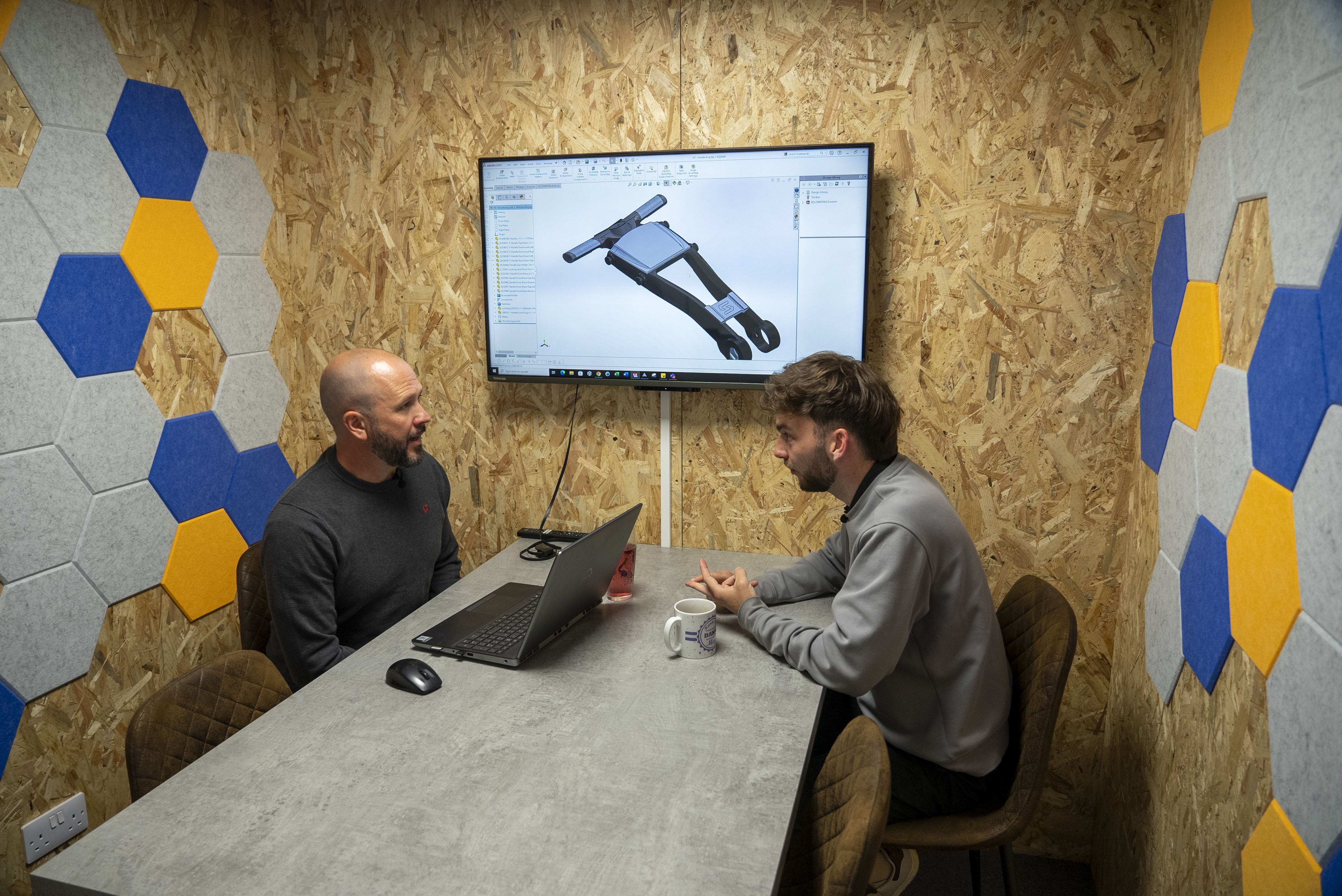 Mark Stewart and Dan Parker discussing the philosophy behind Stewart Golf products