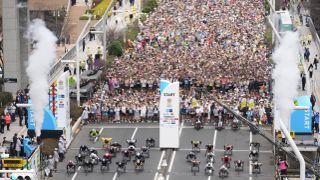 Wheelchair athletes start the Tokyo Marathon as they pass the Tokyo Metropolitan Government Building in the Shinjuku area of downtown Tokyo on March 2, 2025. 