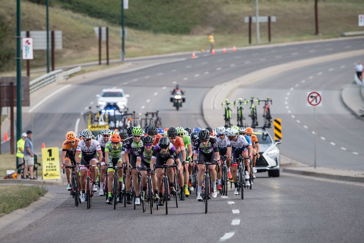 The Lupus team swell to the front of the peloton