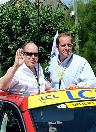 Tour director Christian Prudhomme (R) was joined by Prince Albert II of Monaco in the red Skoda today.