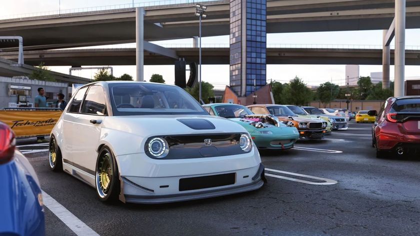 Modified white Honda car with custom wheels parked among colorful cars in a lot beneath an overpass, conveying a lively, urban auto-show vibe.