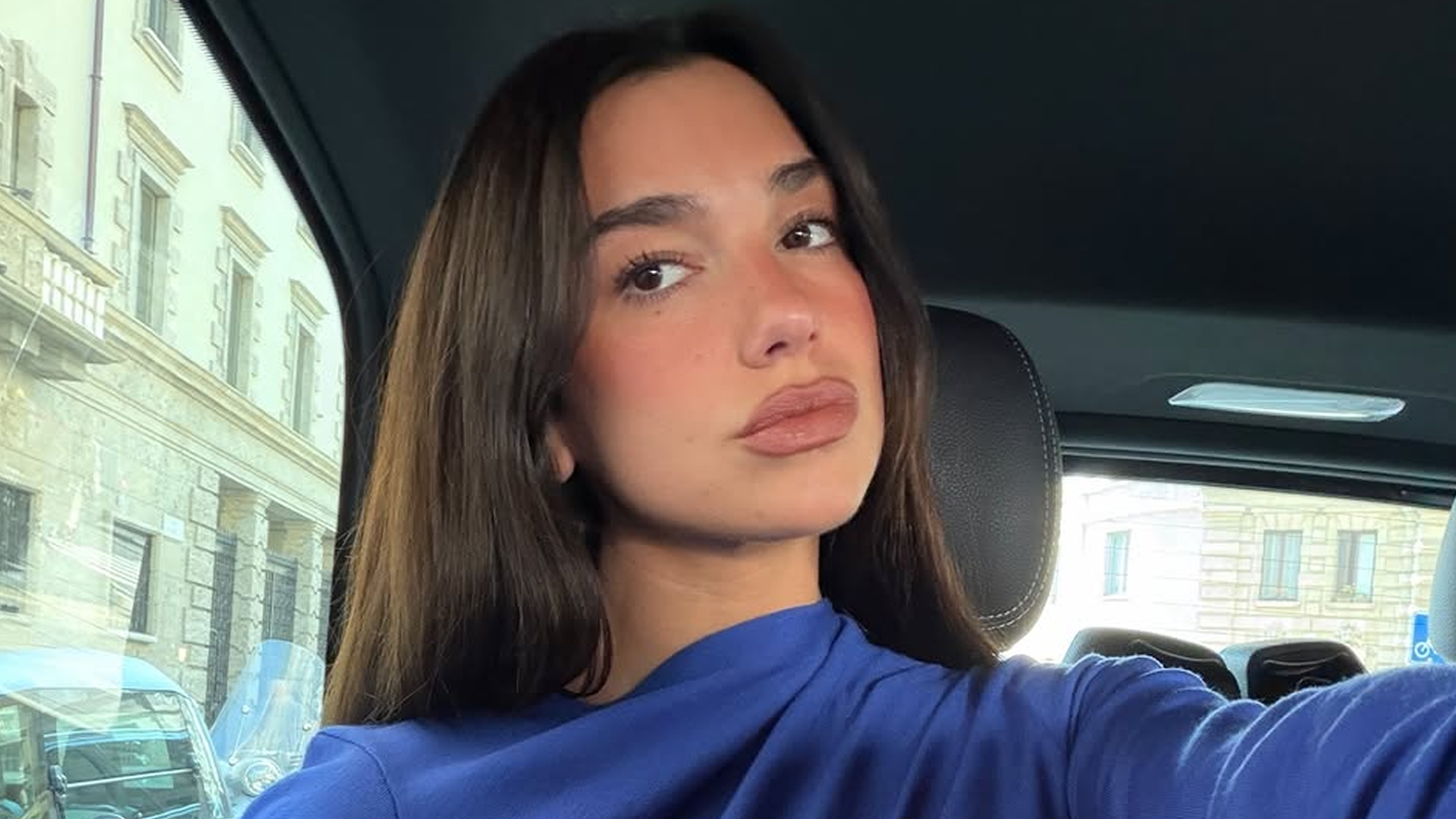 Dua Lipa pulled off the cobalt blue 2026 color trend in a vibrant Chlo&eacute; dress