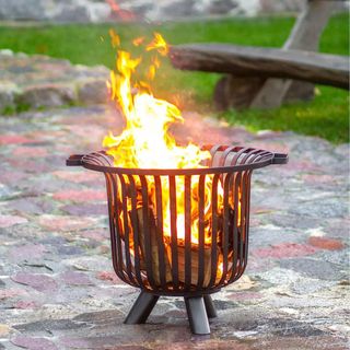 Dunelm Verona Fire Basket on patio area in garden