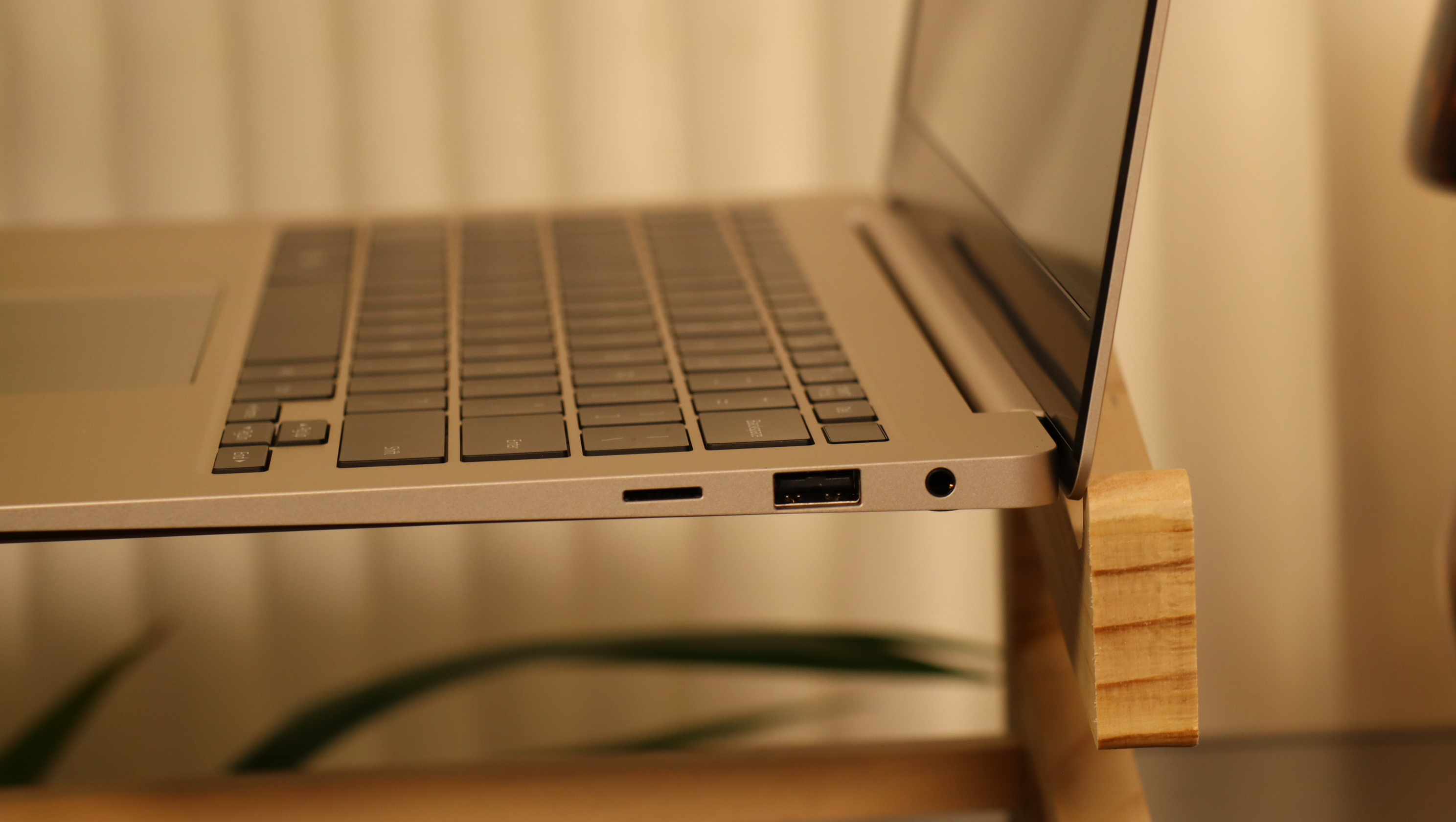 Samsung Galaxy Book3 on a wooden stand