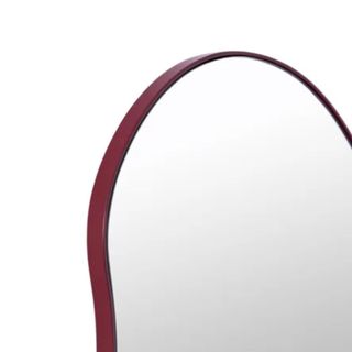 A mirror with a red border