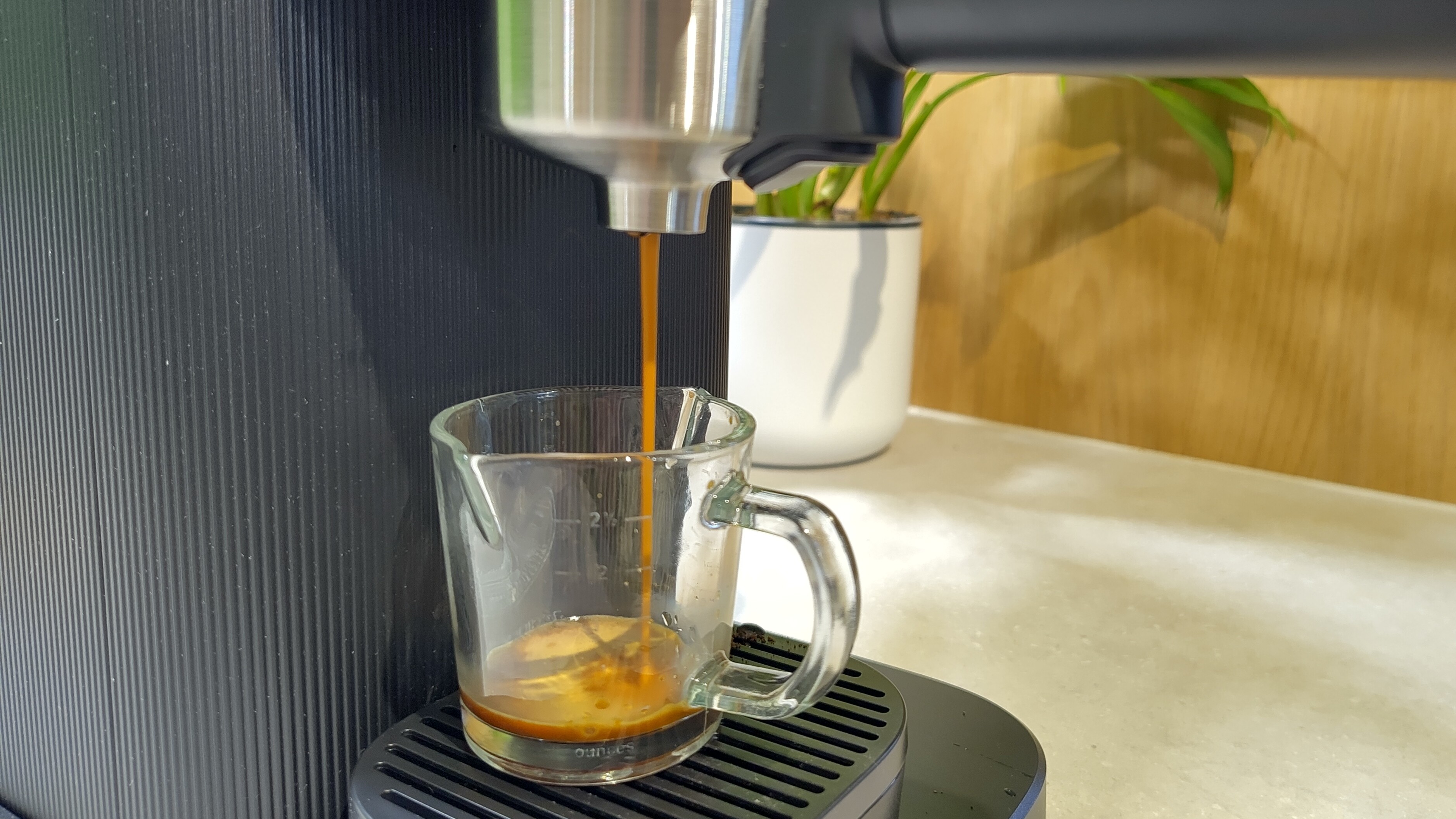 Philips Baristina espresso machine dispensing espresso