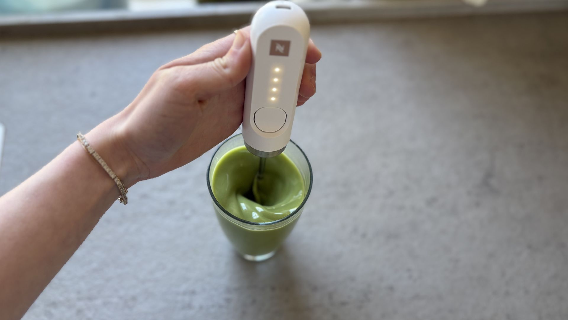 Nespresso NanoFoamer Milk Frother being tested