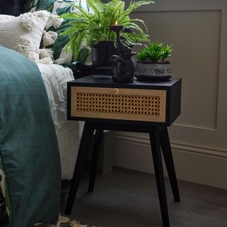Bedroom with B&M black and rattan bedside table