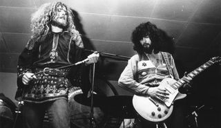 Robert Plant (left) and Jimmy Page perform onstage with Led Zeppelin in 1971