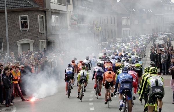 Flares provided an extra hazard for the peloton to avoid