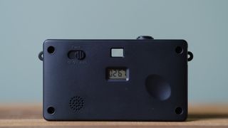 The Camp Snap, in forest green, sits on a table