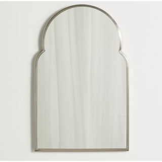 simple gothic arched mirror with a silver frame