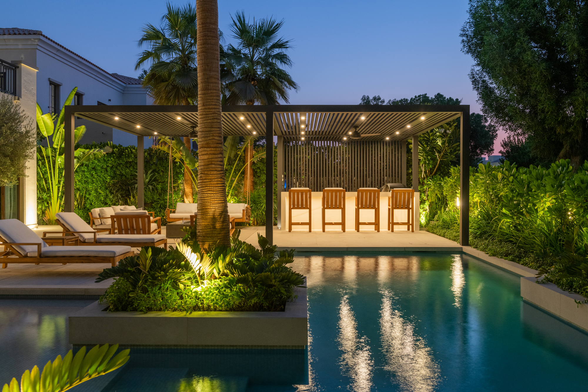 A pergola with downlighting