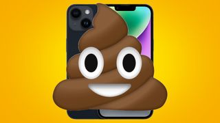 A poop emoji atop an iPhone 14