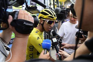 Egan Bernal (Team Ineos) talks to the press ahead of stage 21 Tour de France