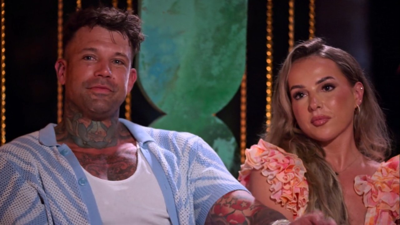 Dave Hand and Sophie Willett sitting next to each other in Perfect Match.