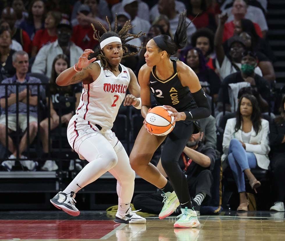  A&#039;ja Wilson #22 of the Las Vegas Aces is guarded by Myisha Hines-Allen #2 of the Washington Mystics in the first quarter of their game at Michelob ULTRA Arena on August 11, 2023 in Las Vegas, Nevada. The Aces defeated the Mystics 113-89.