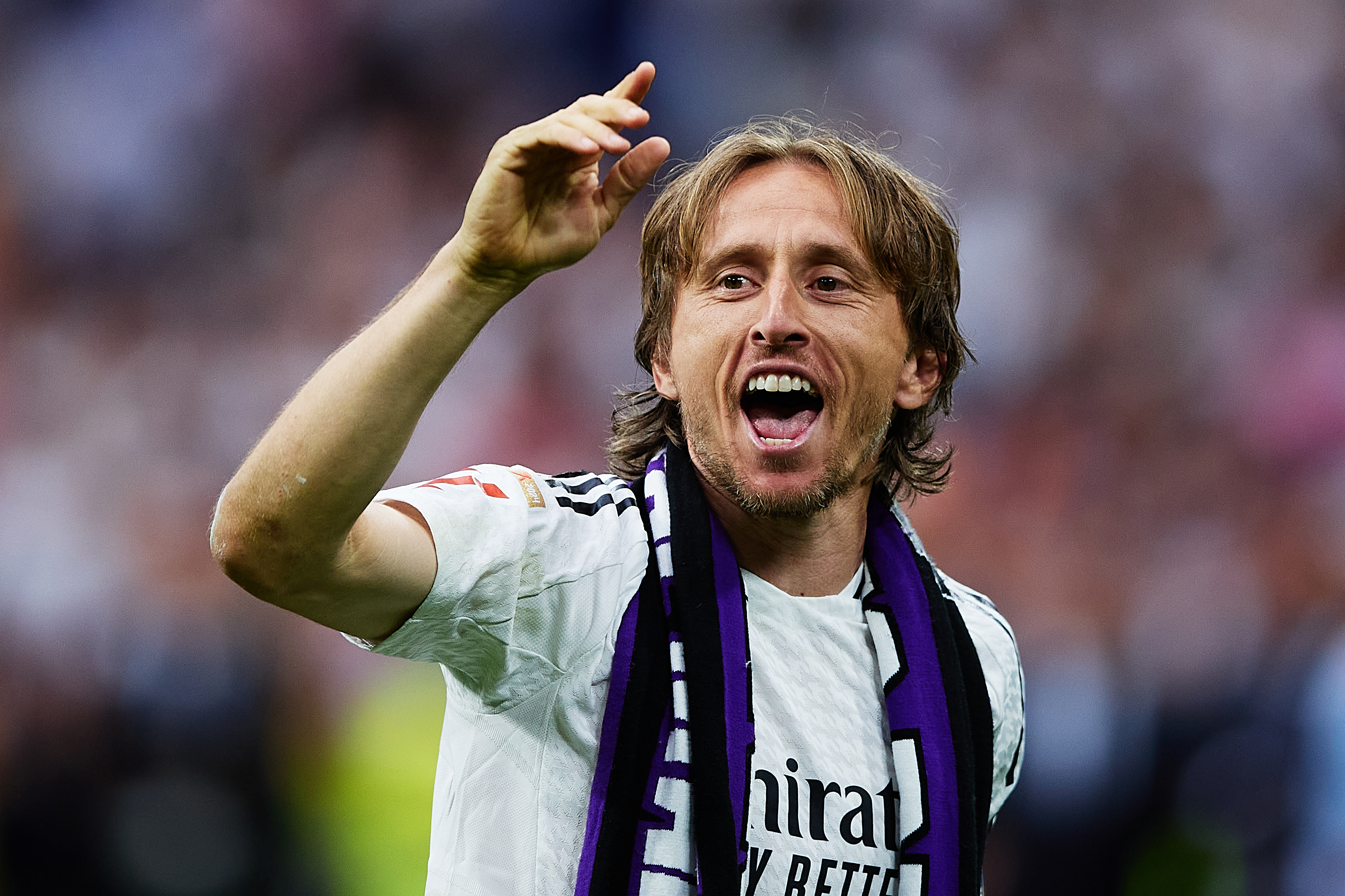 Luka Modric shows his appreciation to Real Madrid fans following his final appearance at the Santiago Bernabeu in May 2025.