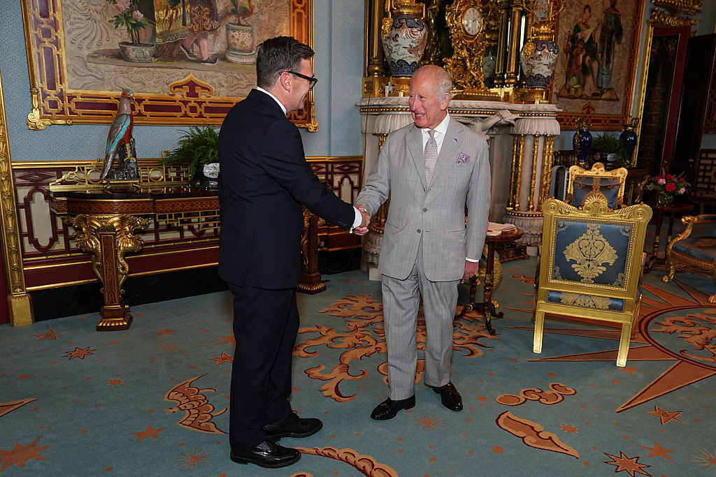 King Charles Britain's King Charles III shakes hands with Britain's incoming Prime Minister Andy Burnham, during an audience at Buckingham Palace, London (Photo by Aaron Chown / POOL / AFP)